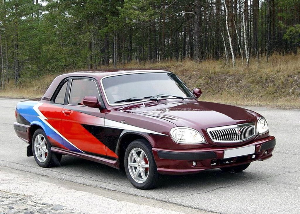 Maroon car with colorful stripes