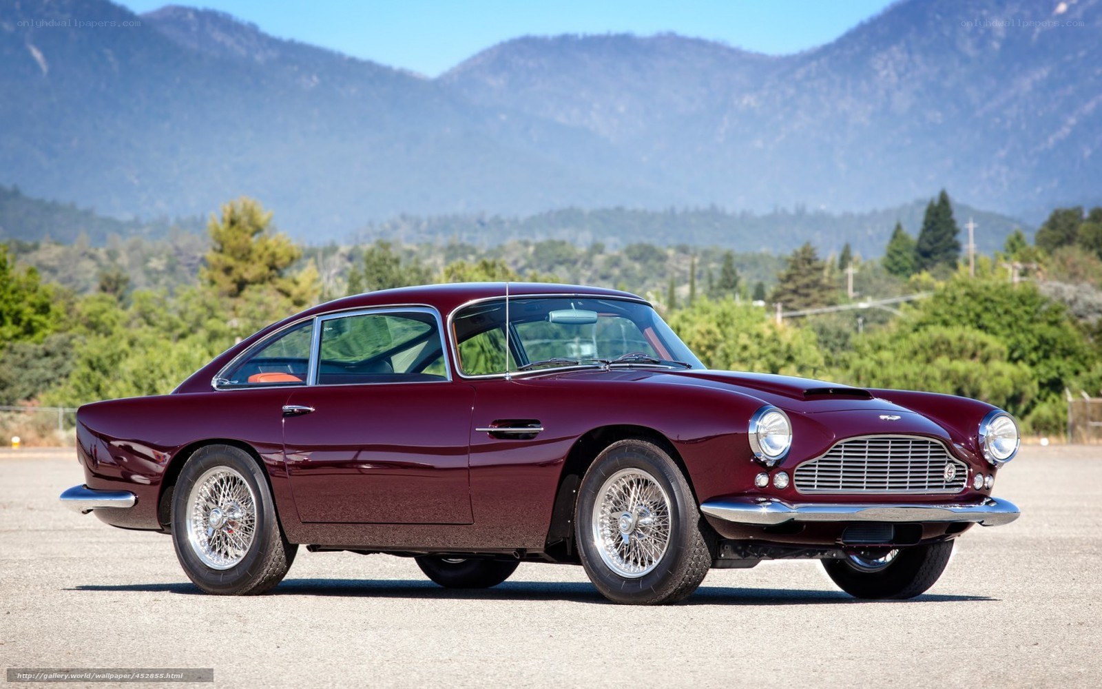 Maroon classic Aston Martin car