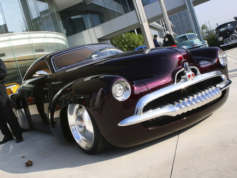 Maroon classic car at show