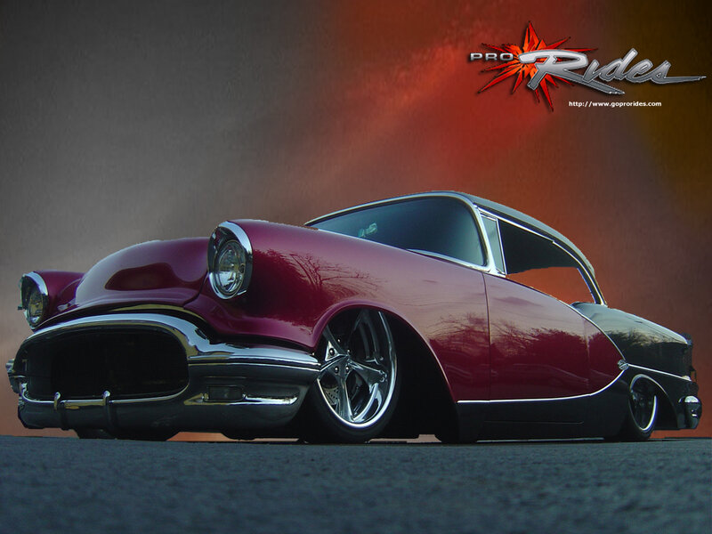 maroon classic car on display