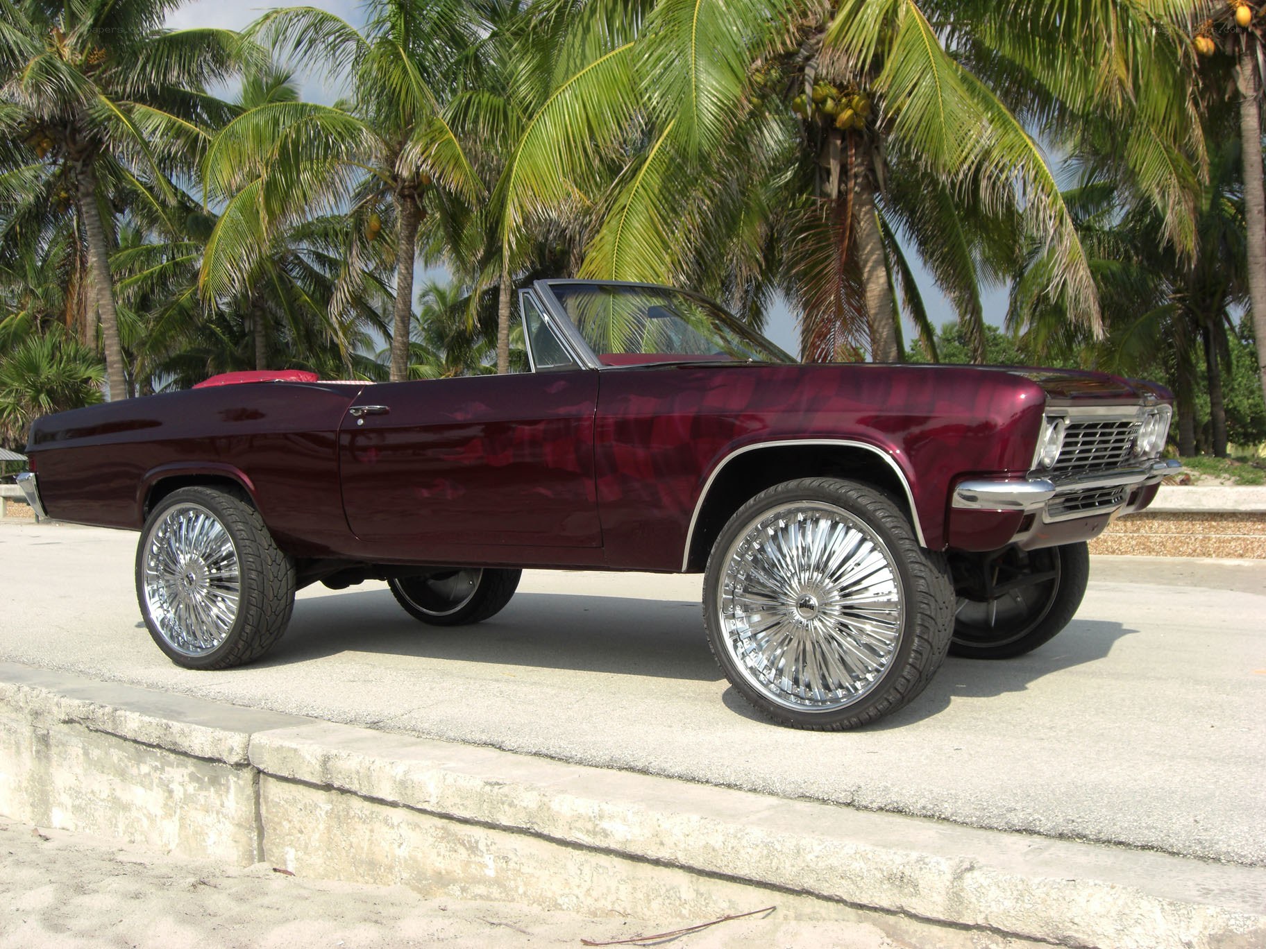 Maroon classic convertible car