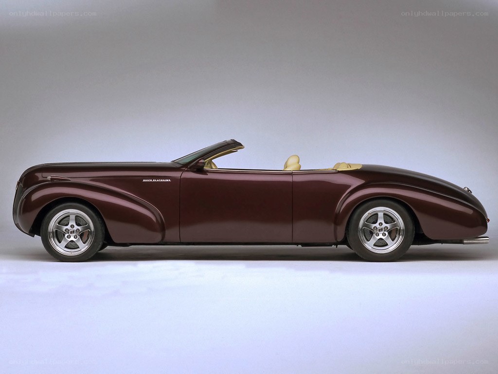 maroon convertible car