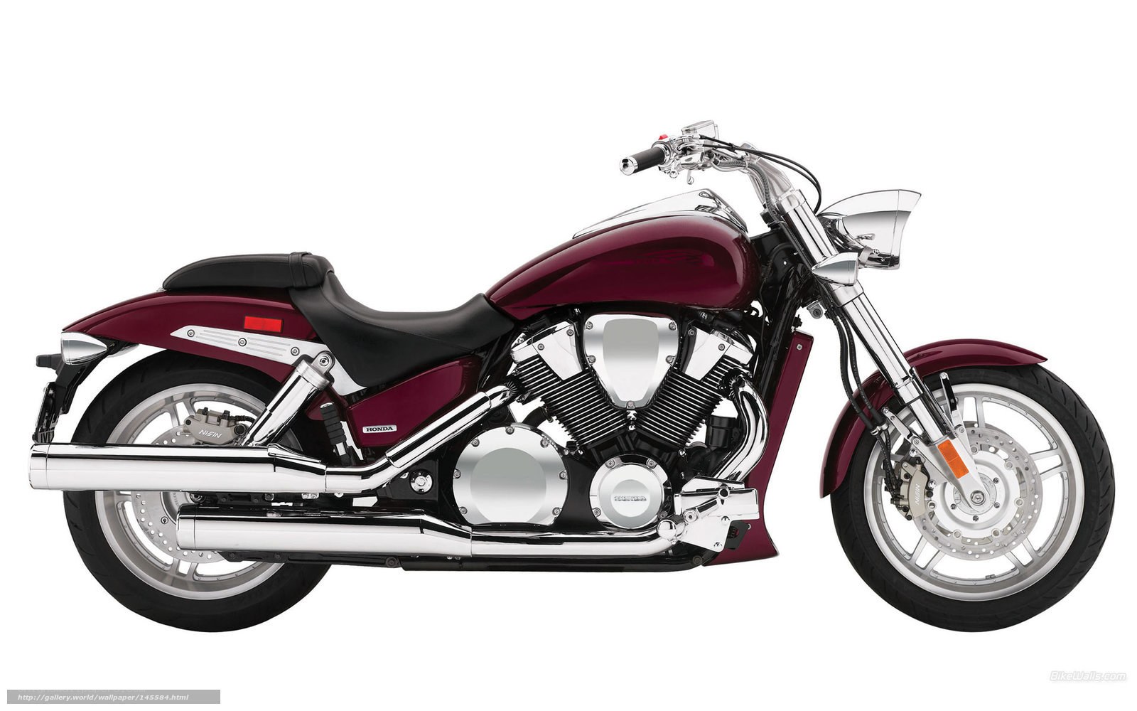maroon cruiser motorcycle