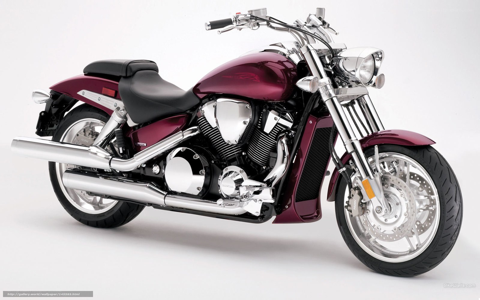 maroon cruiser motorcycle