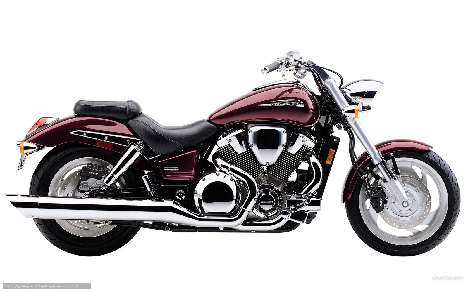 maroon cruiser motorcycle