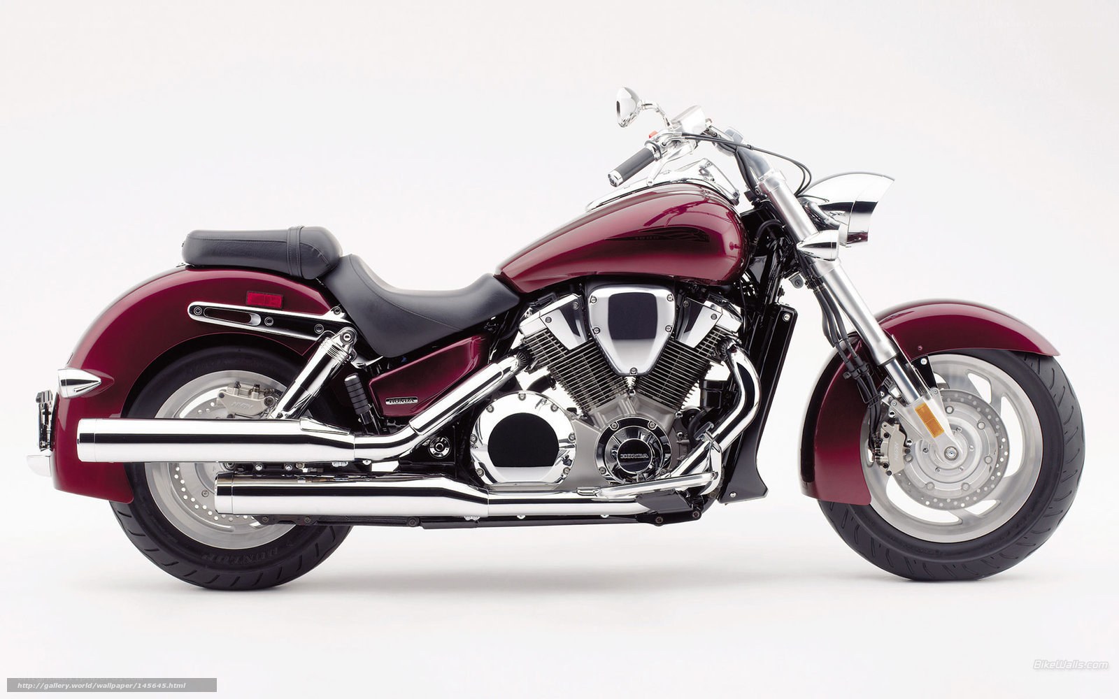 maroon cruiser motorcycle