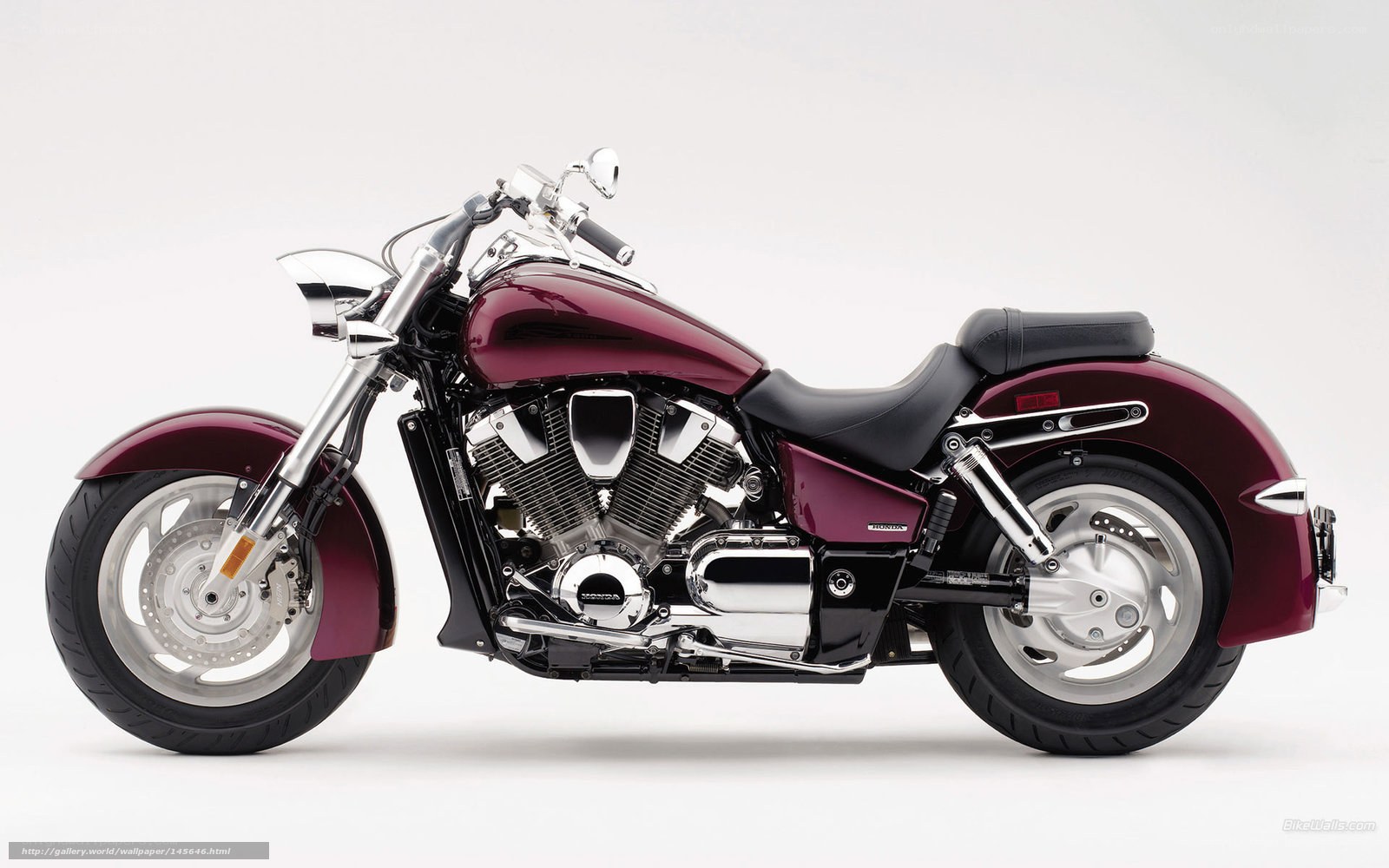 maroon cruiser motorcycle