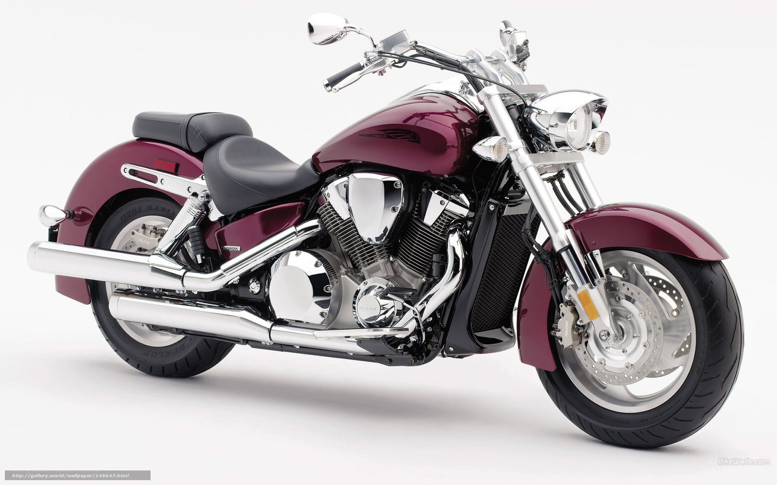 maroon cruiser motorcycle