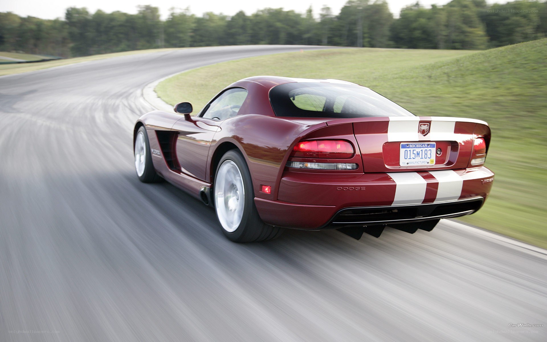 Maroon Dodge Viper on a racetrack