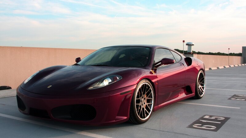 maroon ferrari sports car