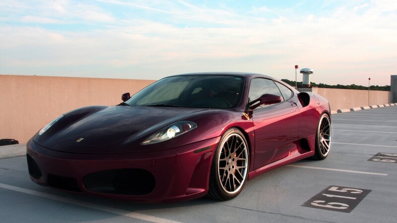 maroon ferrari sports car