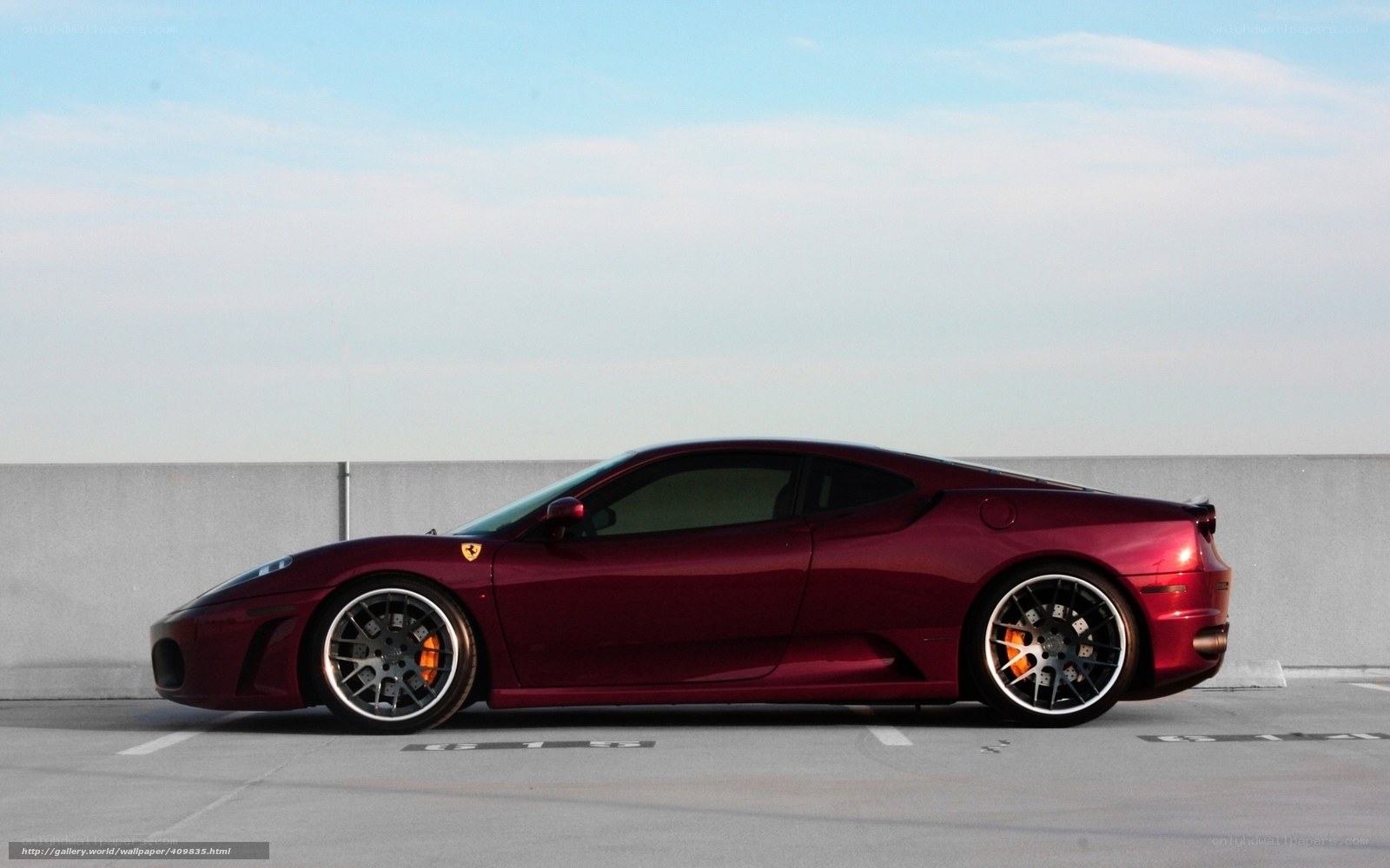 maroon ferrari sports car