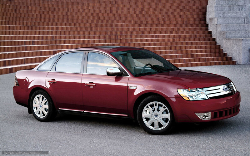 maroon ford taurus sedan