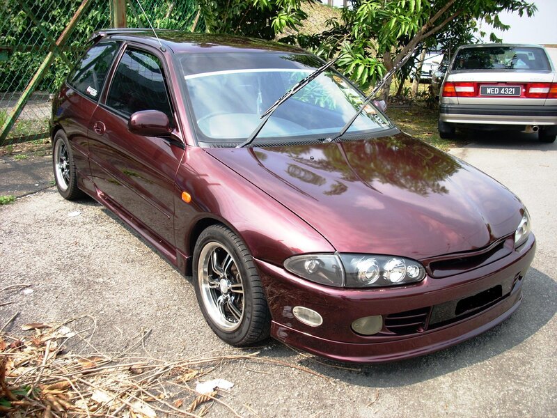 maroon hatchback car