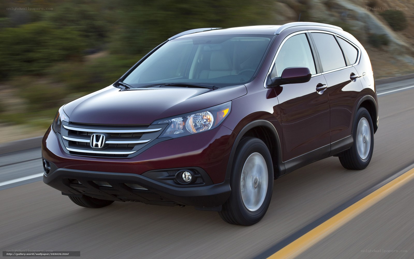 Maroon Honda CR-V in motion