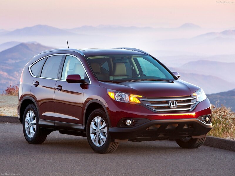 Maroon Honda CR-V on a mountain road