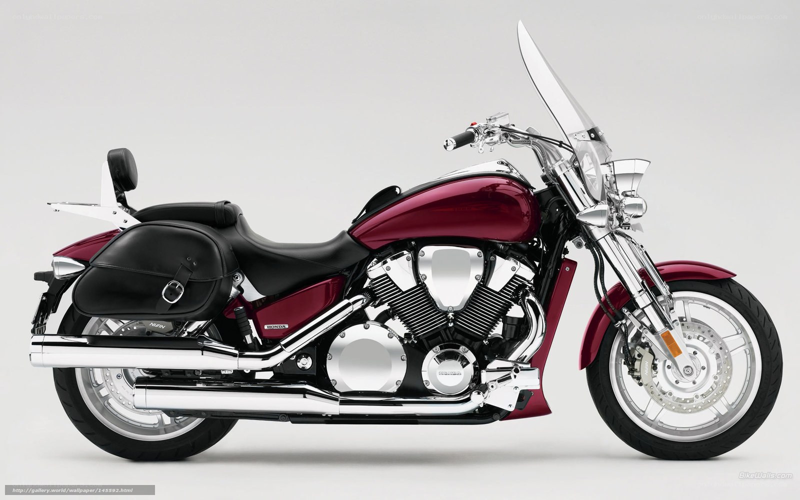 Maroon Honda cruiser motorcycle