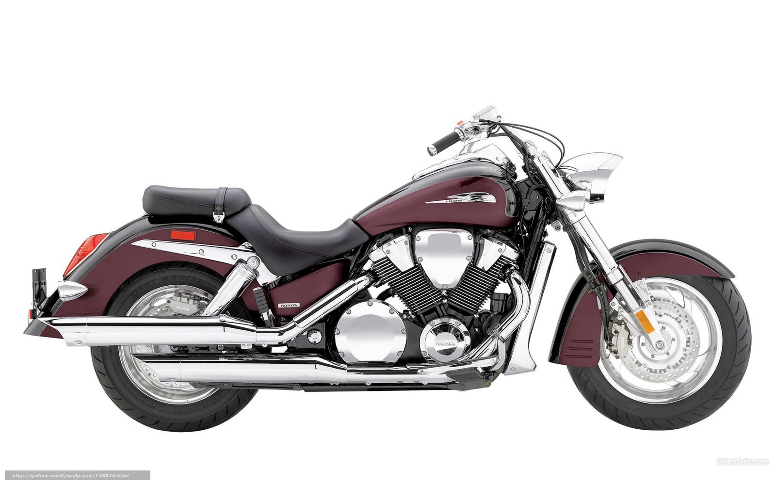 Maroon Honda cruiser motorcycle