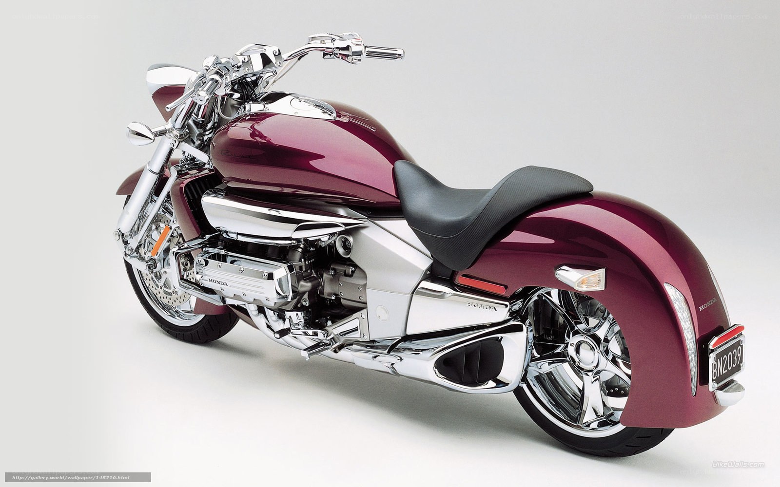 Maroon Honda motorcycle