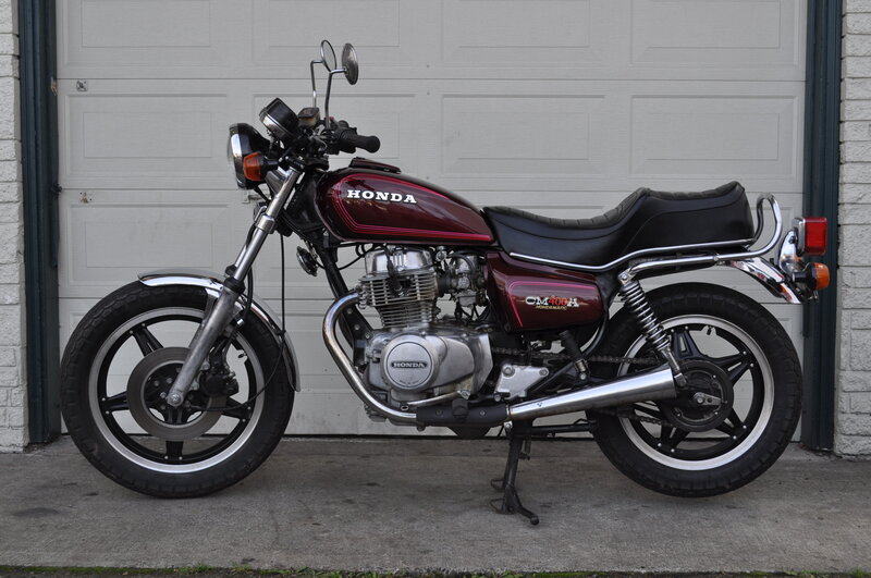 Maroon Honda Motorcycle — Neutral