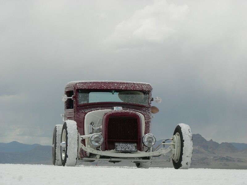 Maroon hot rod on salt flat