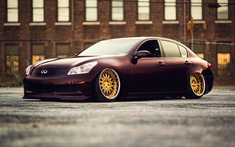 maroon infinti g37 with gold wheels