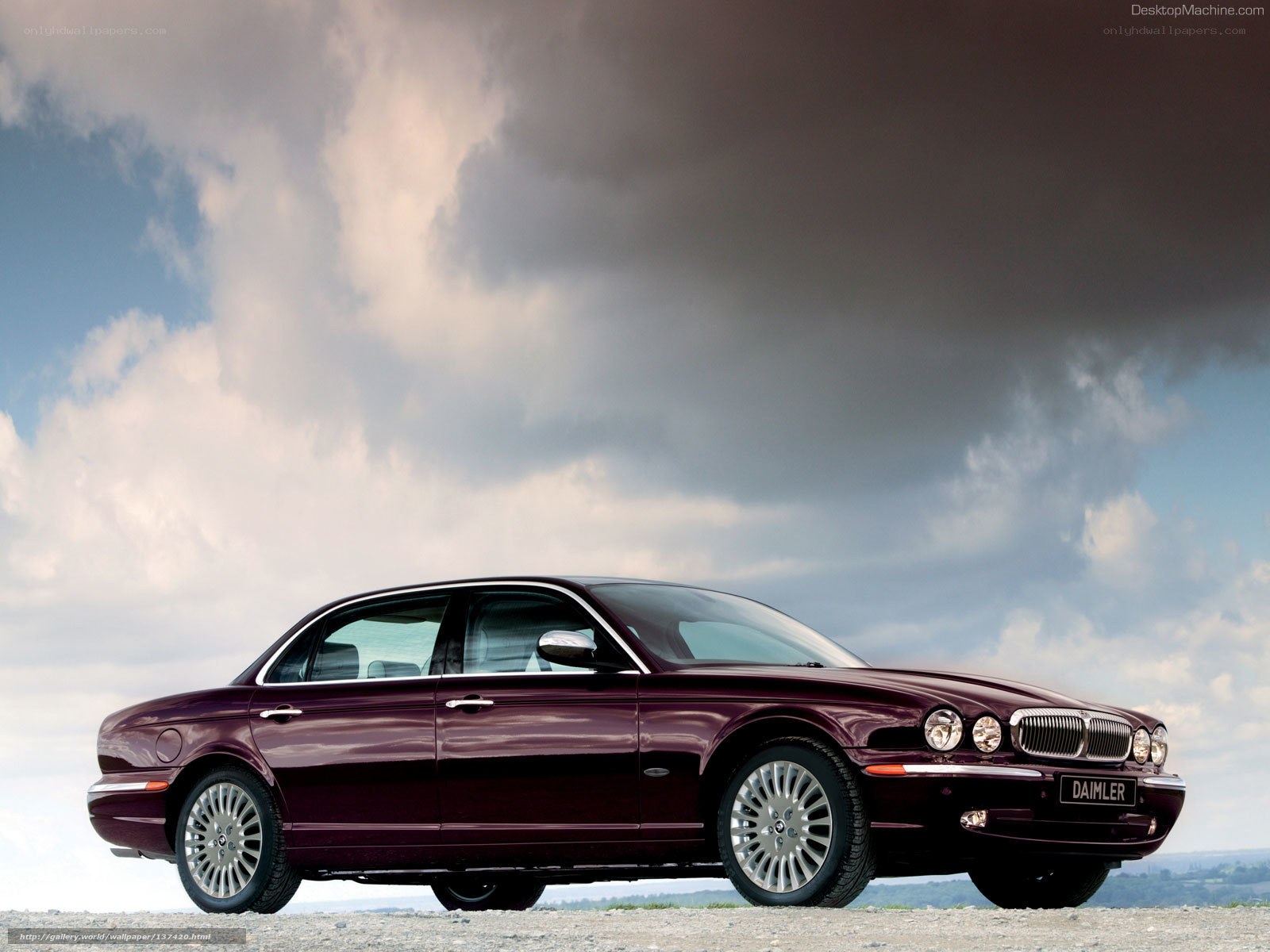maroon jaguar daimler sedan
