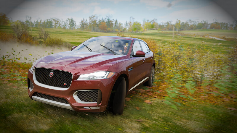 Maroon Jaguar Suv