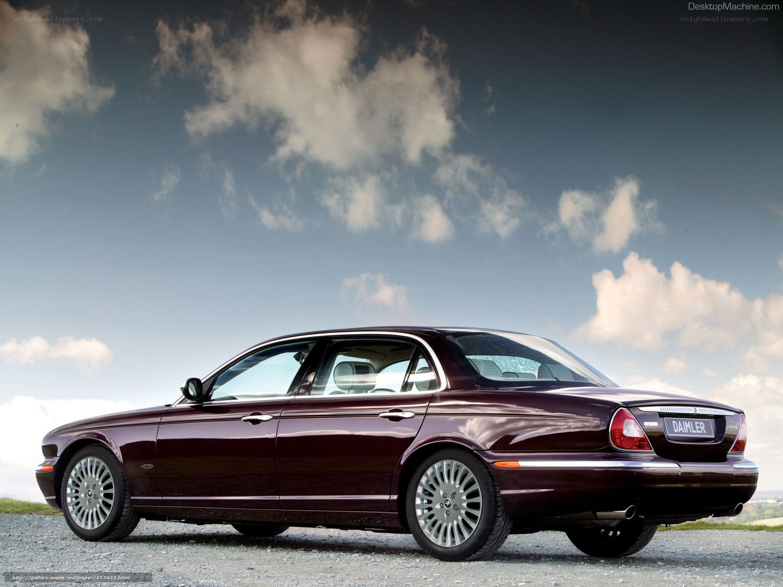 maroon jaguar xj sedan