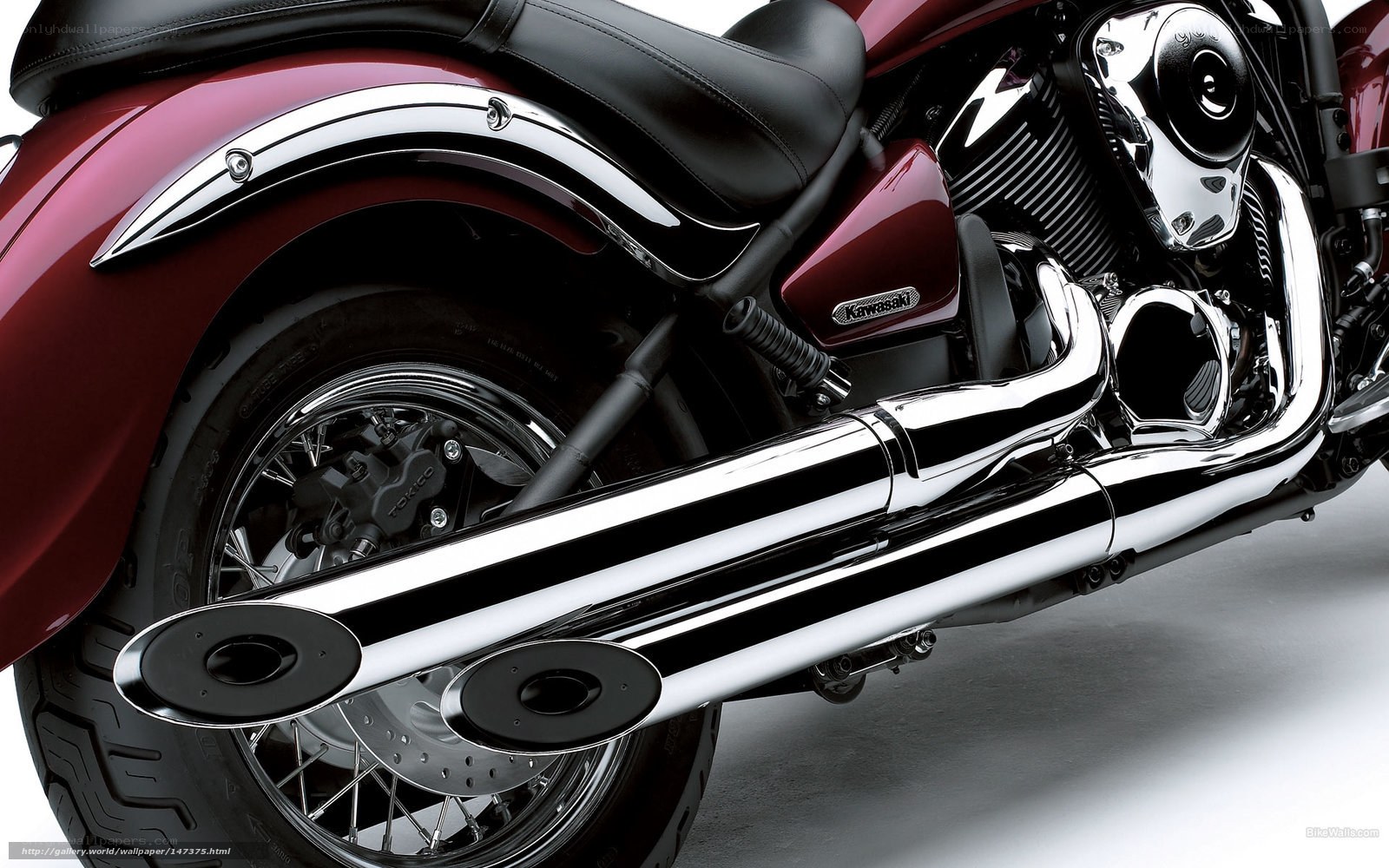 Maroon Kawasaki motorcycle