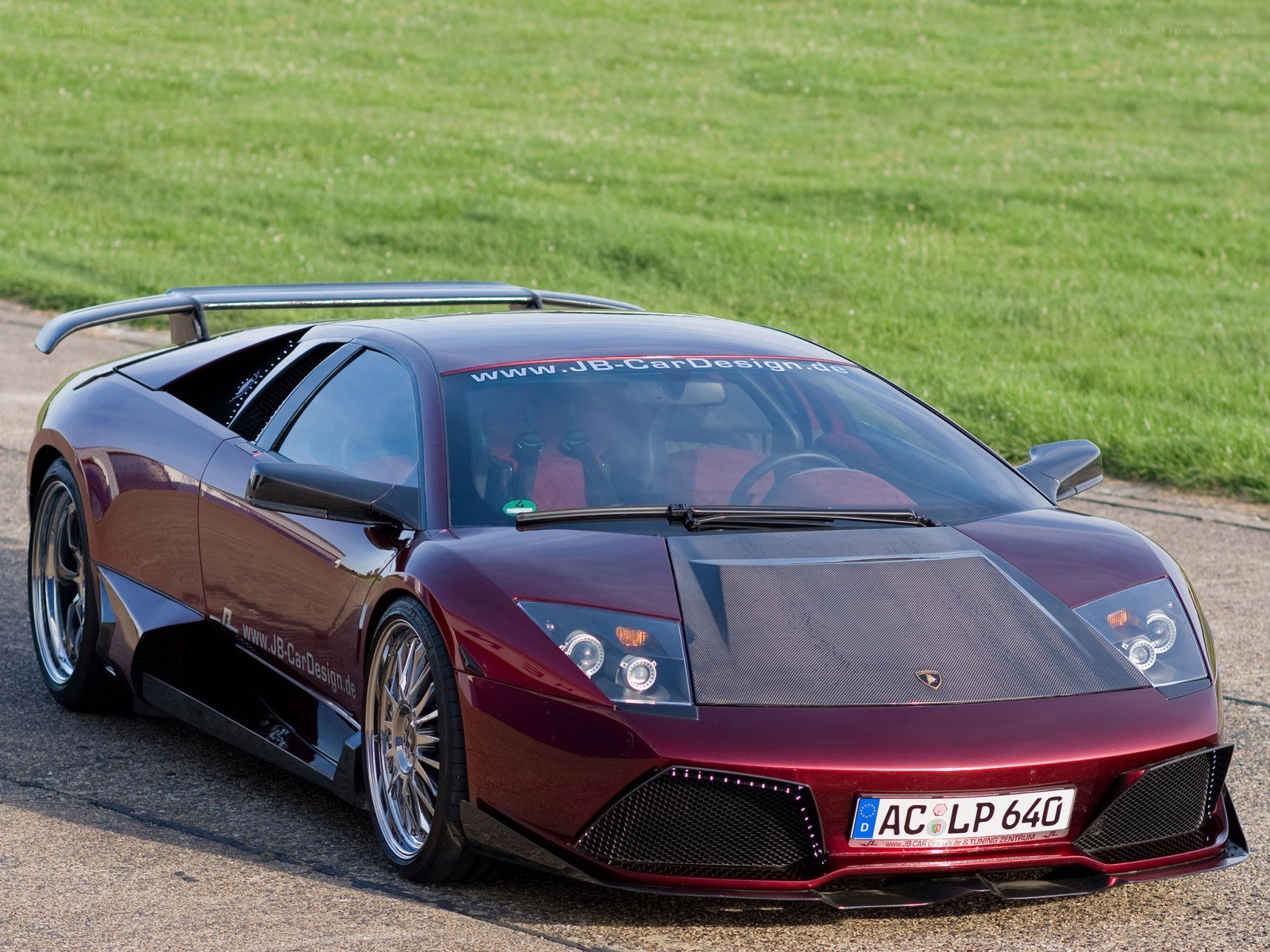 Maroon Lamborghini with custom body kit