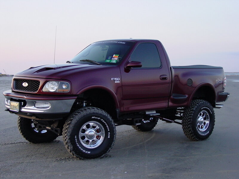 Maroon Lifted Pickup Truck