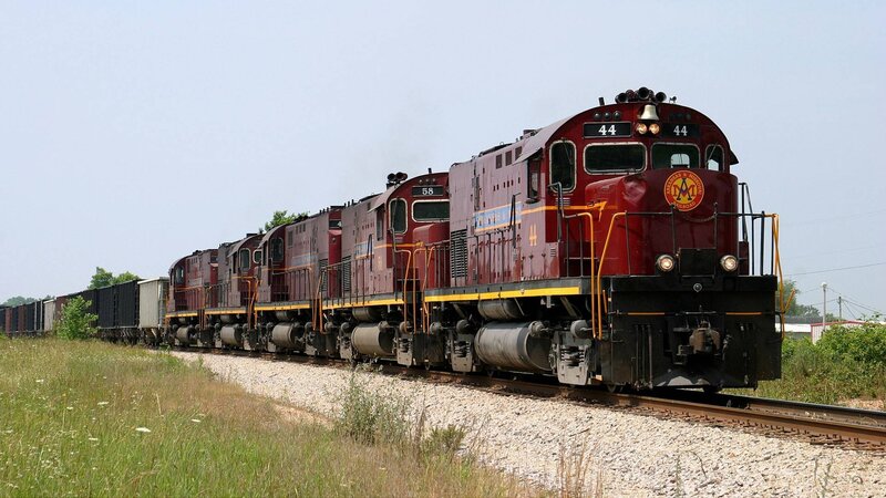 Maroon Locomotives on Track