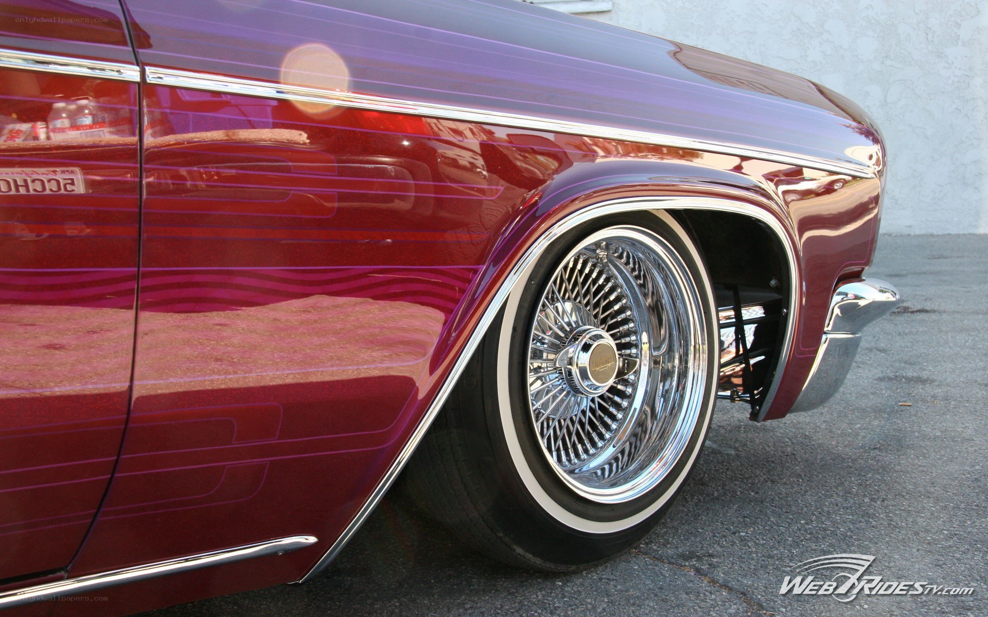 maroon lowrider car