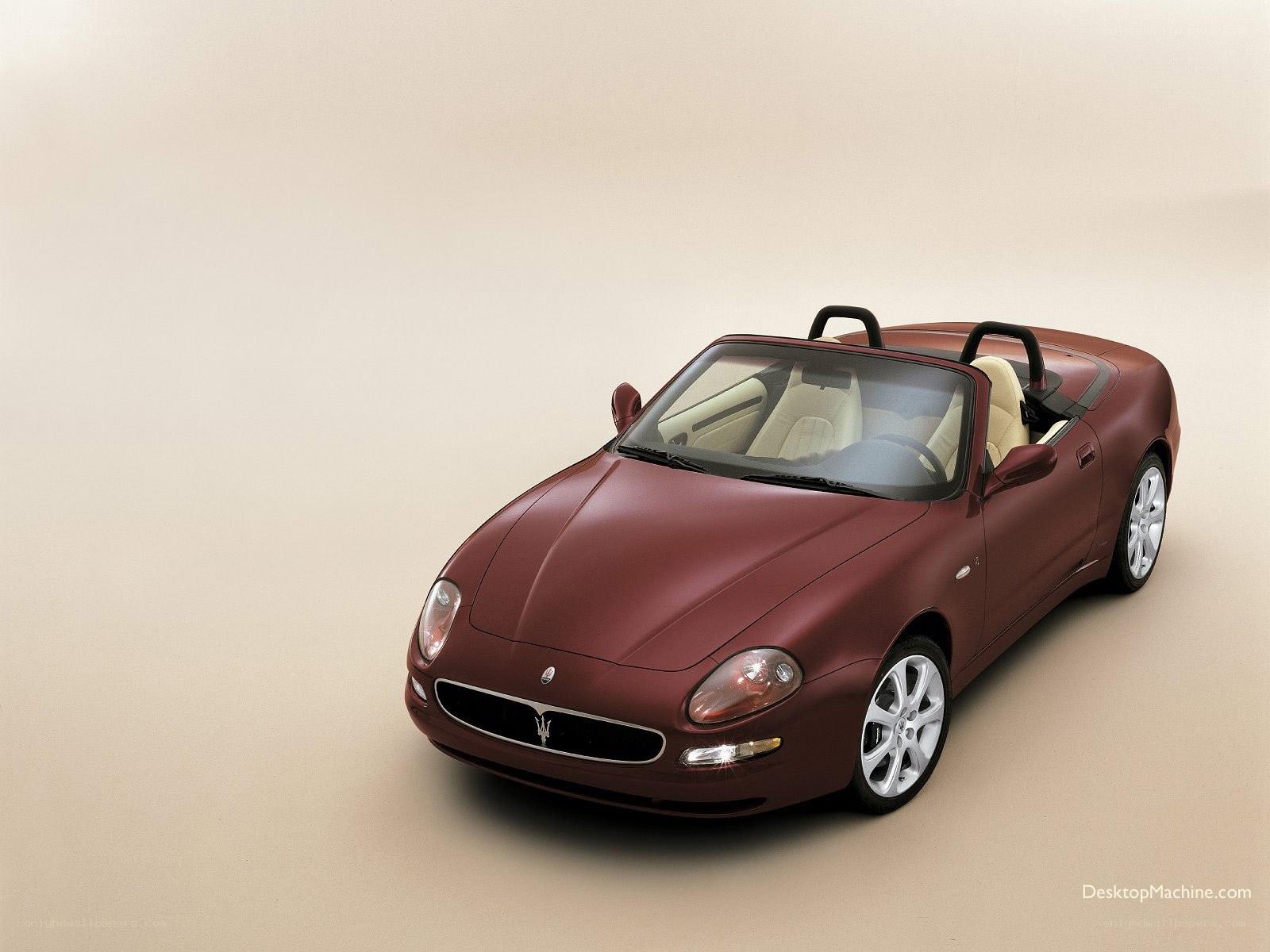 maroon maserati convertible