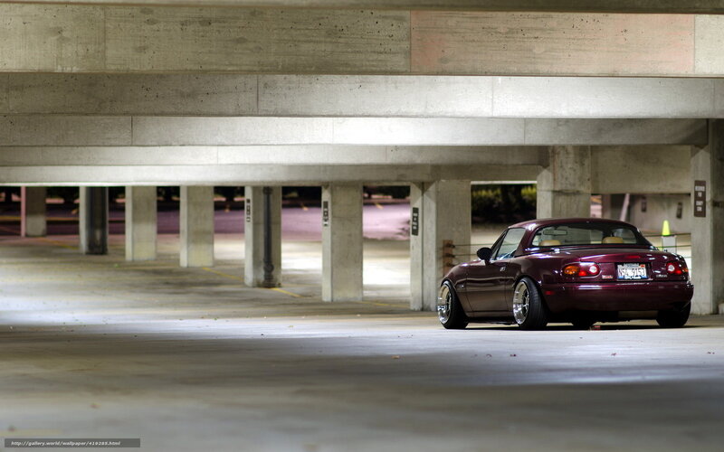 Maroon Miata in parking garage