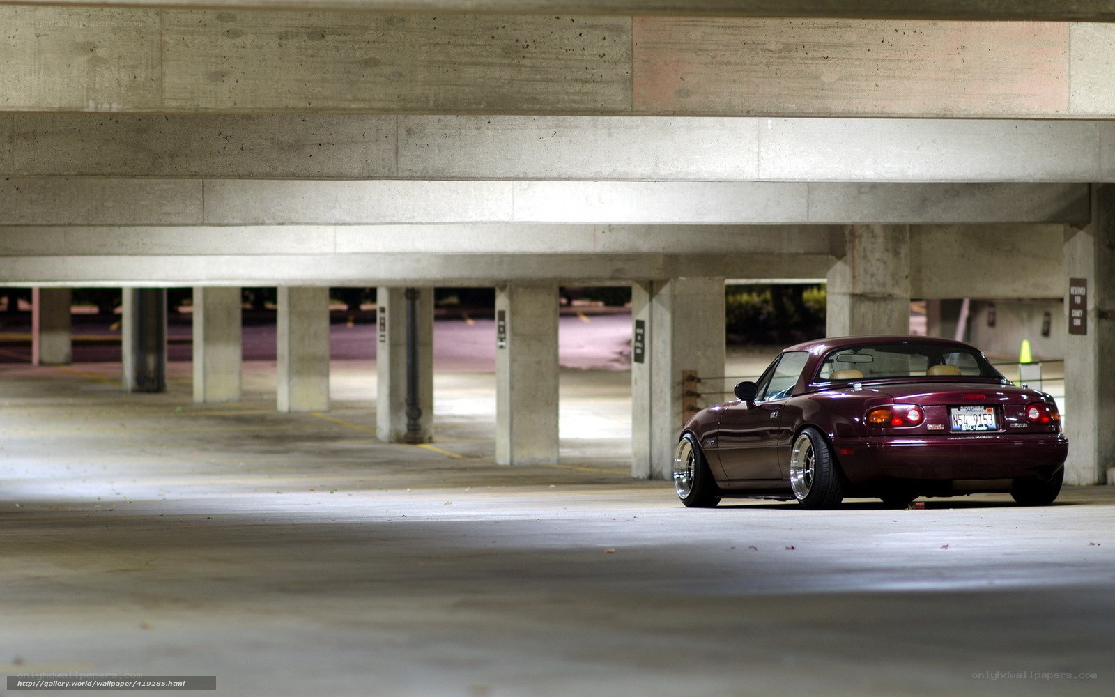 Maroon Miata in parking garage