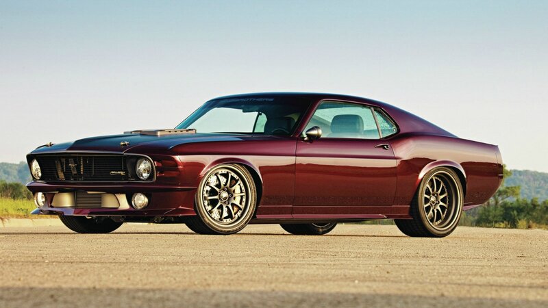 maroon muscle car on road