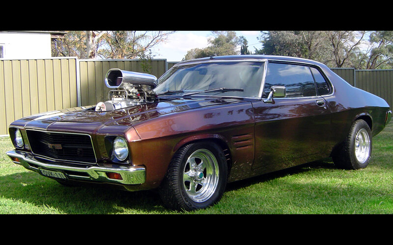 Maroon muscle car with supercharger