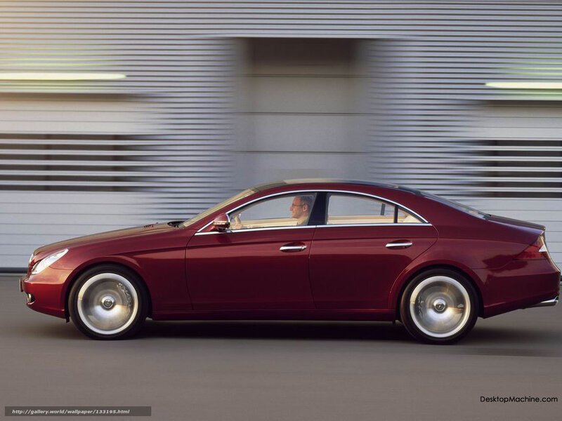 Maroon sedan in motion