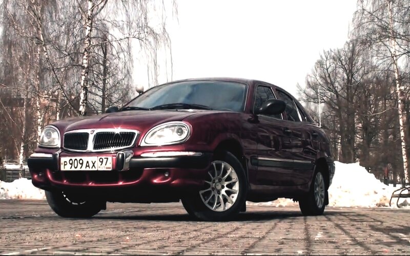 Maroon sedan in winter