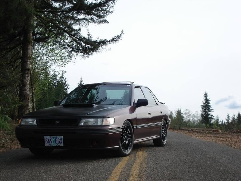 Maroon Sedan on Road