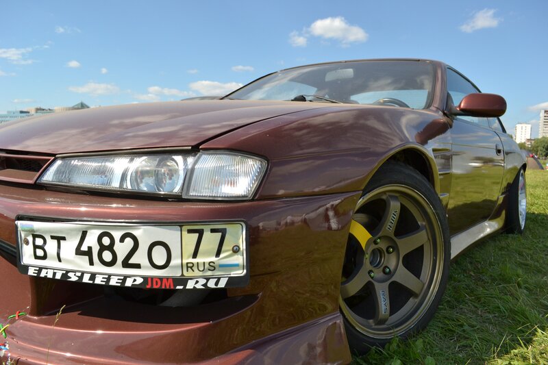 Maroon Sports Car — Brown