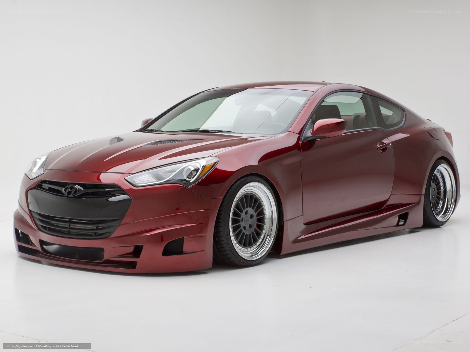 maroon sports coupe car