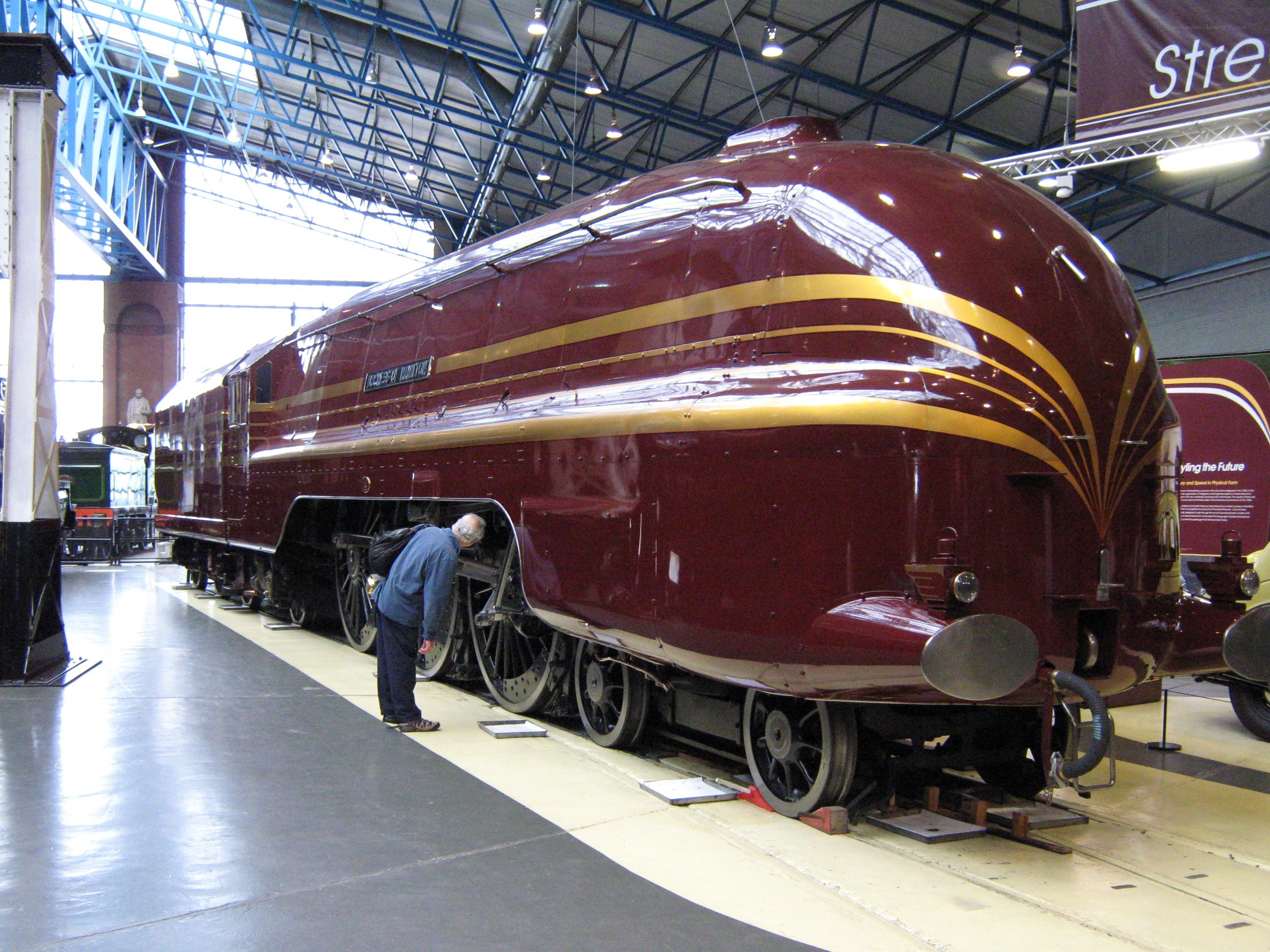 Maroon steam locomotive on display