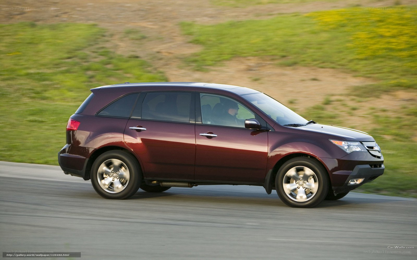 Maroon SUV in motion on road
