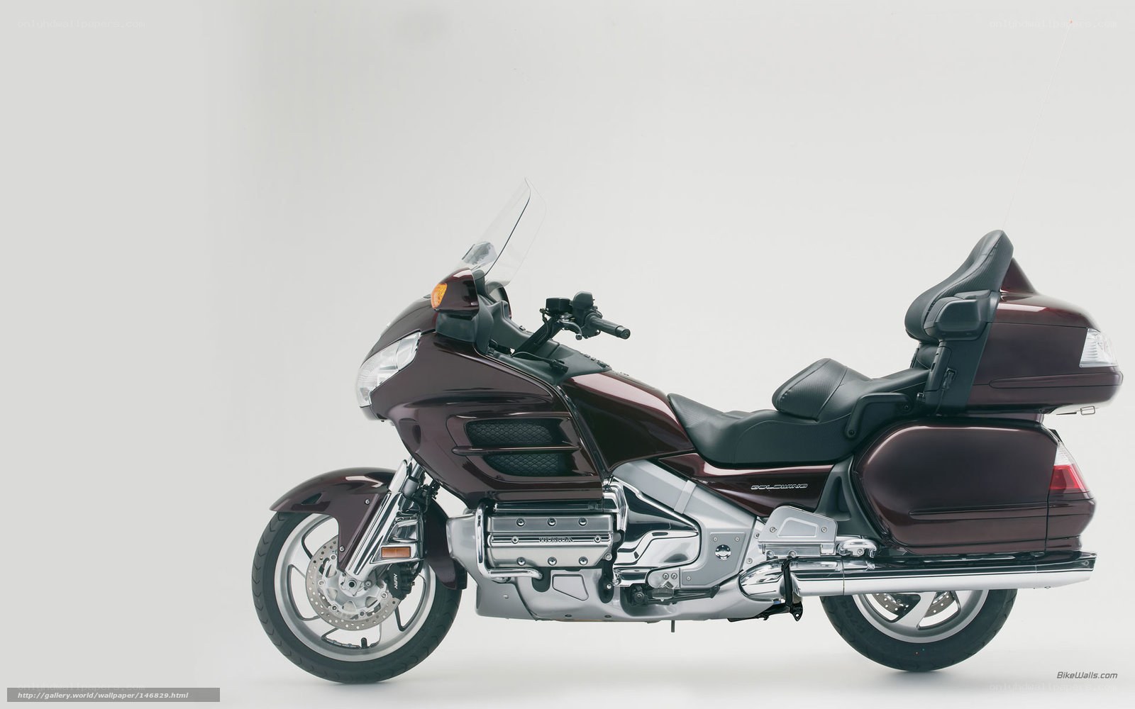 maroon touring motorcycle