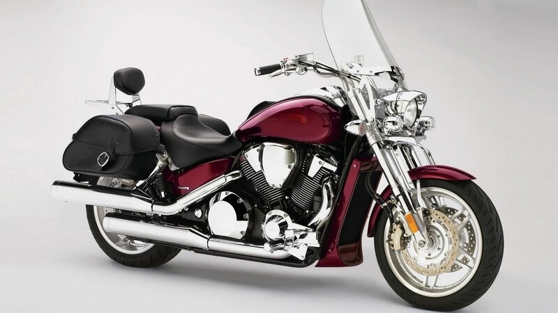 maroon touring motorcycle