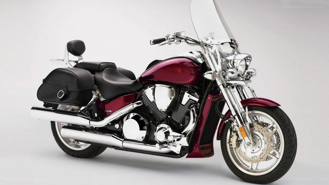 maroon touring motorcycle