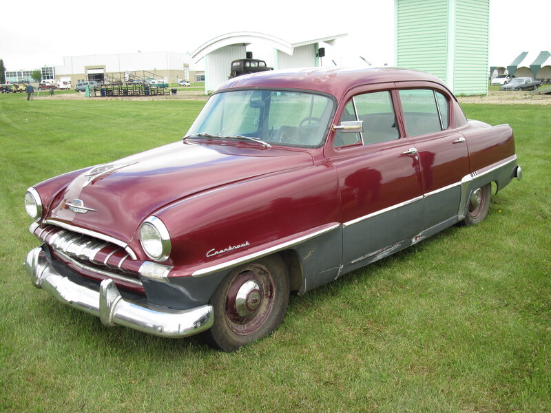 Maroon Vintage Car — Calm, Afternoon, Photograph, Grass Field, Building